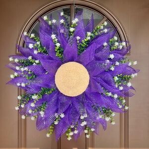 Flower style wreath. Handmade an available in a variety of colors.